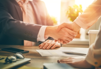 Two people shaking hands