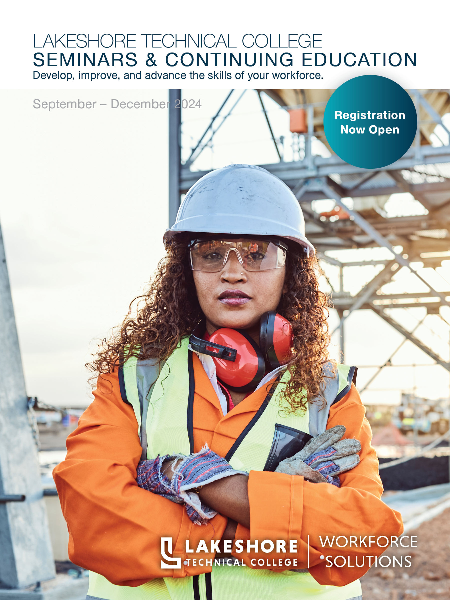 A women in a hi vis vest with her arms crost